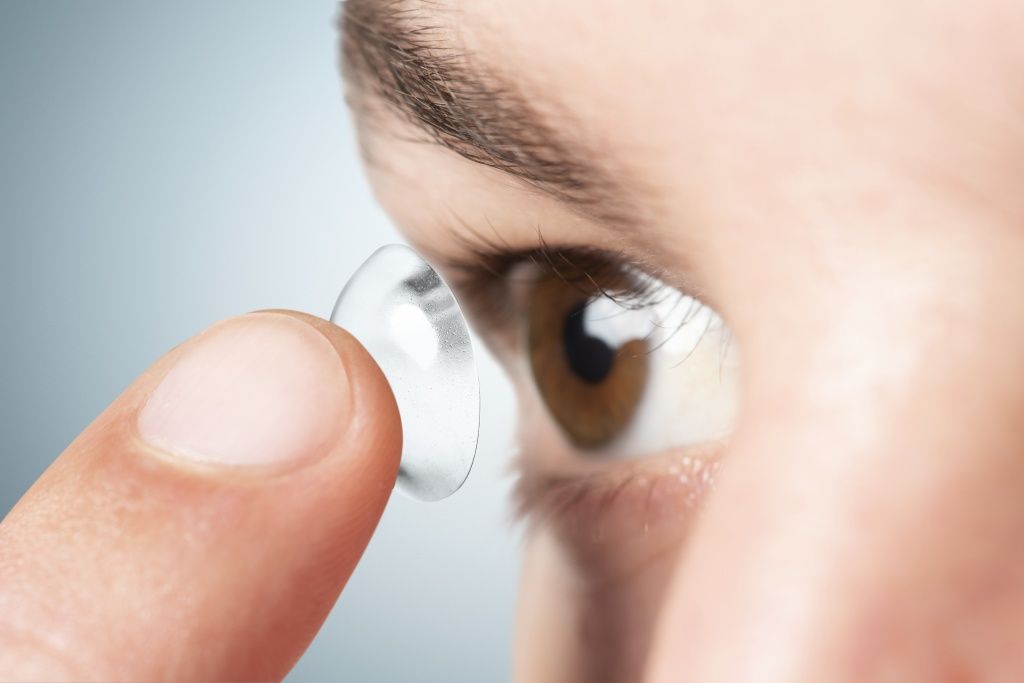 man-applying-his-contact-lens.jpg